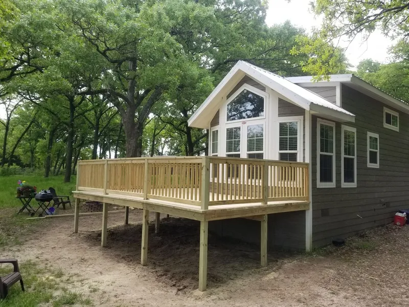 Hand-cut cedar timber trusses and structural porch roof columns