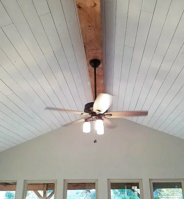 Cash, Texas open living space showing exposed cedar beams